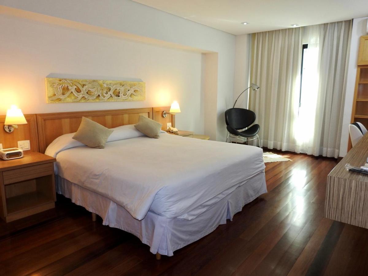 Constantino Hotel E Eventos Juiz de Fora Exteriör bild A bedroom at the hotel