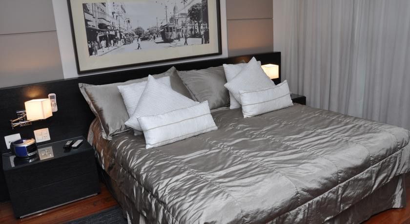 Constantino Hotel E Eventos Juiz de Fora Exteriör bild A bed with a duvet